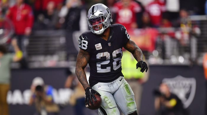 Las Vegas Raiders running back Josh Jacobs scores a touchdown against the San Francisco 49ers on Jan. 1, 2023.